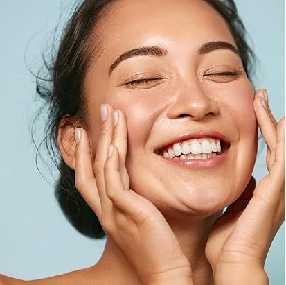 woman with smile and glowing skin